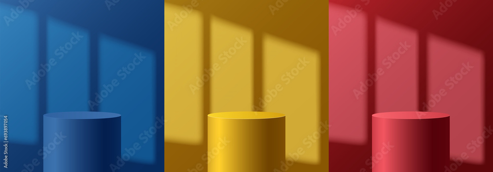 Light podium with shadow from window on wall. Abstract empty room with set of red, yellow and blue color cylinder stand pedestal. stage for showcase, display presentation. Studio room concept Light podium with shadow from window on wall. Abstract empty room with set of red, yellow and blue color cylinder stand pedestal. stage for showcase, display presentation. Studio room concept