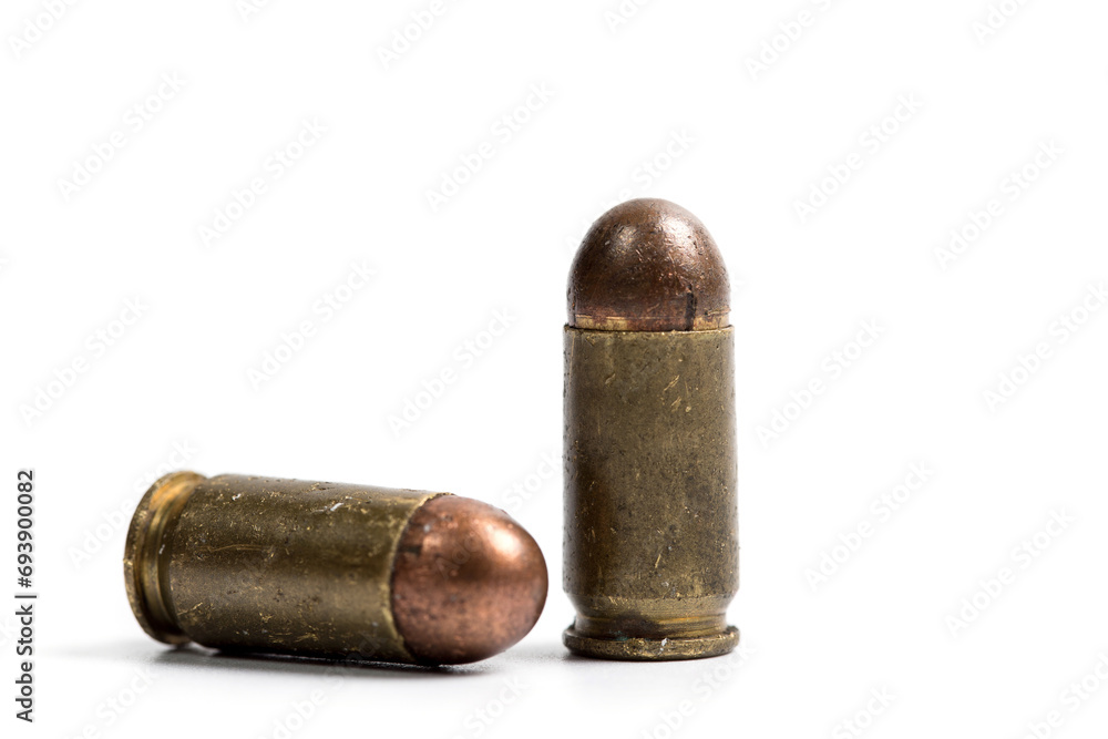 Firearms bullets on a white background, 9mm pistol cartridge