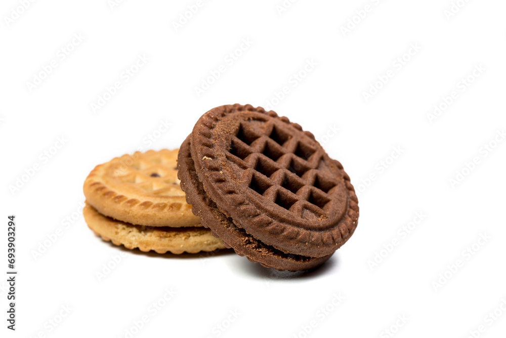 Chocolate and vanilla round cookies on a white background, round cookies on a white background Chocolate and vanilla round cookies on a white background, round cookies on a white background