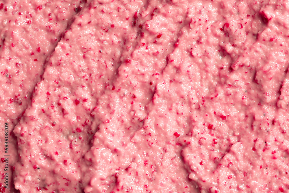Berry yoghurt ice cream. Smoothies from fresh fruits and berries. Ice cream texture. Delicious sweet dessert close-up as a background. Berry yoghurt ice cream. Smoothies from fresh fruits and berries. Ice cream texture. Delicious sweet dessert close-up as a background.