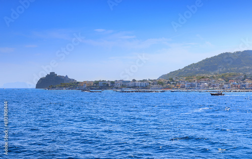 Iconic view of Ischia Island in Italy. Townscape of Ischia Ponte from sea.  © vololibero