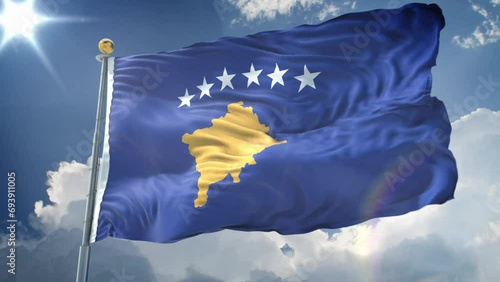 Kosovo animated flag in the wind with blue sky photo