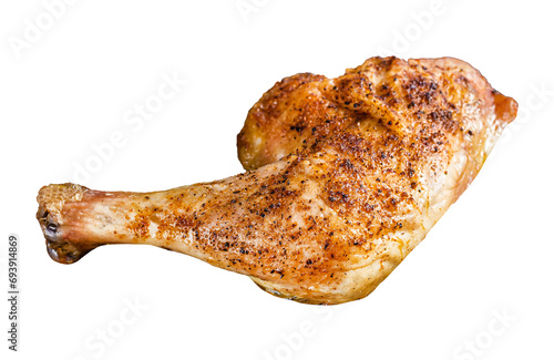 Grilled chicken leg on a wooden board. Transparent background. Isolated.
