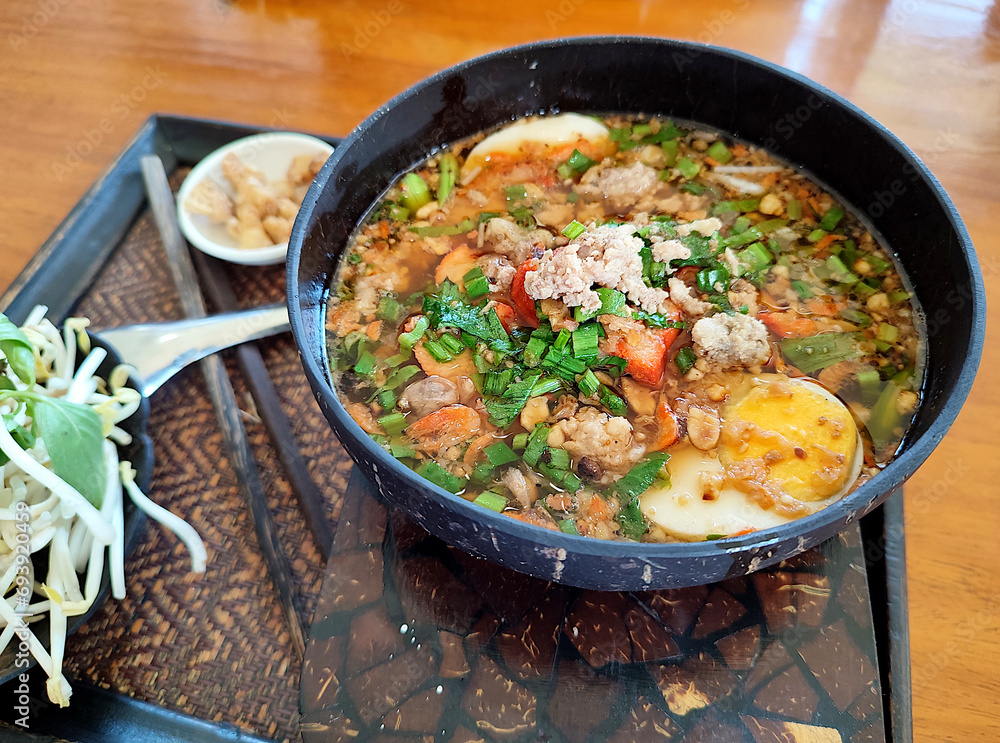 Spicy (Tom Yum) noodles with minced pork and boiled egg