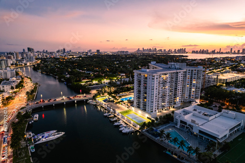 Miami Beach, Florida, USA - Evening aerial of Indian Creek and the distant Miami skyline. © Mdv Edwards