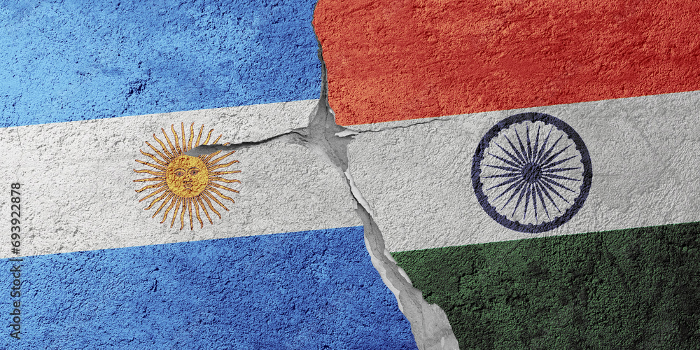 Argentina and India flags on a stone wall with a crack, illustration of the concept of a global crisis in political and economic relations
