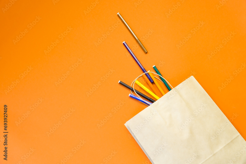 Top view brown paper shopping bag on colourful background, Mock-up of blank brown paper shopping bag and copy space. Flat lay. Top view brown paper shopping bag on colourful background, Mock-up of blank brown paper shopping bag and copy space. Flat lay.