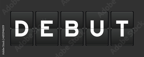 Black color analog flip board with word debut on gray background