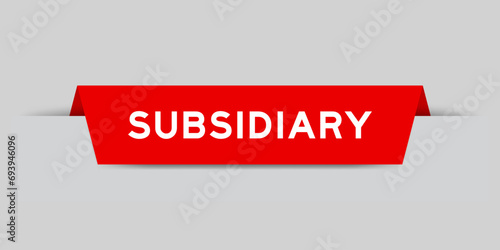Red color inserted label with word subsidiary on gray background