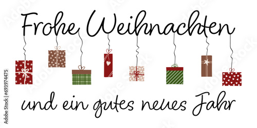 Frohe Weihnachten und ein gutes neues Jahr  - Schriftzug in deutscher Sprache. Grußkarte mit bunten Geschenken. photo