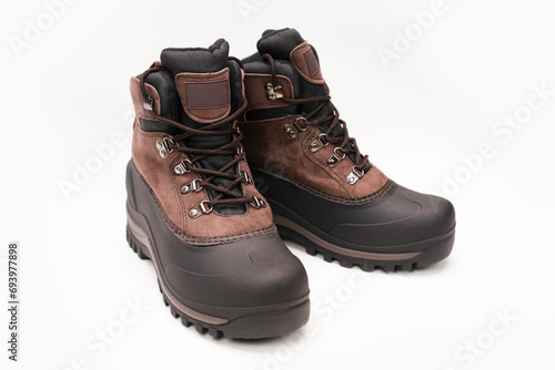 Insulated rubber men's work shoes on a light background for work on the street, construction, in the fields