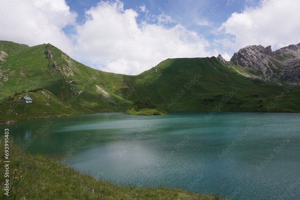 Beautiful turquoise color of lake Schrecksee in the german Alps, Allgäu, Germany