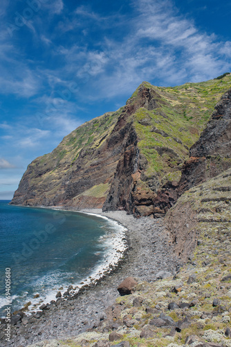 Porto Moniz, Madeira, Portugal – July 29 2023: Dramatic seascape with rugged cliffs and the blue Atlantic Ocean, Achadas da Cruz on the island of Madeira.