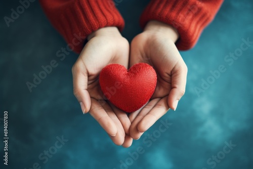 Heart in hands. Background with selective focus and copy space