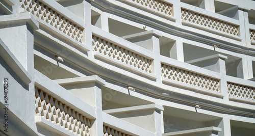 Photo Architectural  detail of white washed apartments balconies
