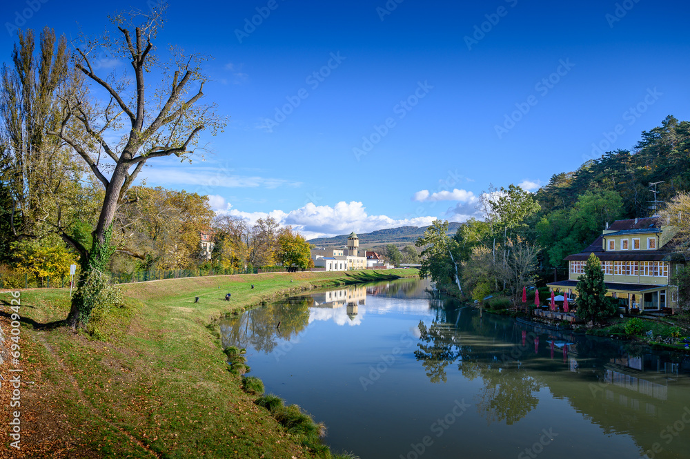 Riverbank of Spa Island with trees and buldings in Piestany (Slovakia)