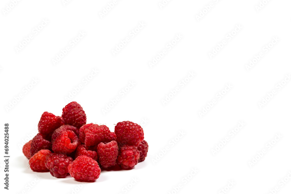 Fresh red raspberries on a white background, raspberries for dessert Fresh red raspberries on a white background, raspberries for dessert