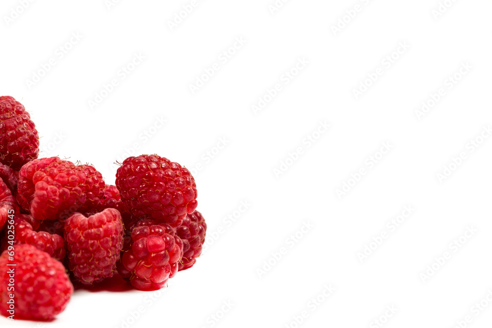 Fresh red raspberries on a white background, raspberries for dessert Fresh red raspberries on a white background, raspberries for dessert