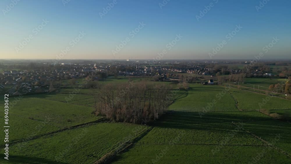 Field Grass Green Forest Trees Village Winter Cold Freezing forward drone aerial countryside Field Grass Green Forest Trees Village Winter Cold Freezing forward drone aerial countryside