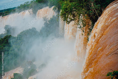 Las Cataratas del Iguazu, en el límite entre Argentina y Brasil, se encuentran una de las Siete Maravillas Naturales del Mundo, con un caudal de agua proveniente del amazonas  photo