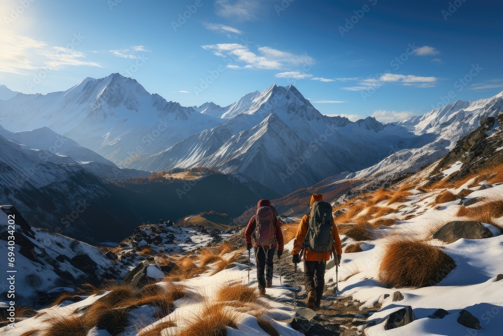 Two adventurous souls conquer the icy terrain of the arctic alps, standing tall on the summit with their trusty hiking equipment as they take in the breathtaking views of the glacial landforms and ma