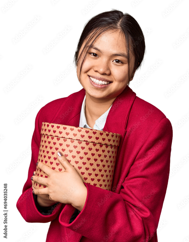 Chinese woman with Valentine's gift box laughing and having fun. Chinese woman with Valentine's gift box laughing and having fun.