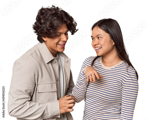 Fototapeta Naklejka Na Ścianę i Meble -  Latino man proposing to Chinese woman, Valentine's theme