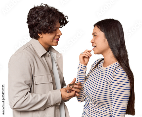 Latino man proposing to Chinese woman, Valentine's theme