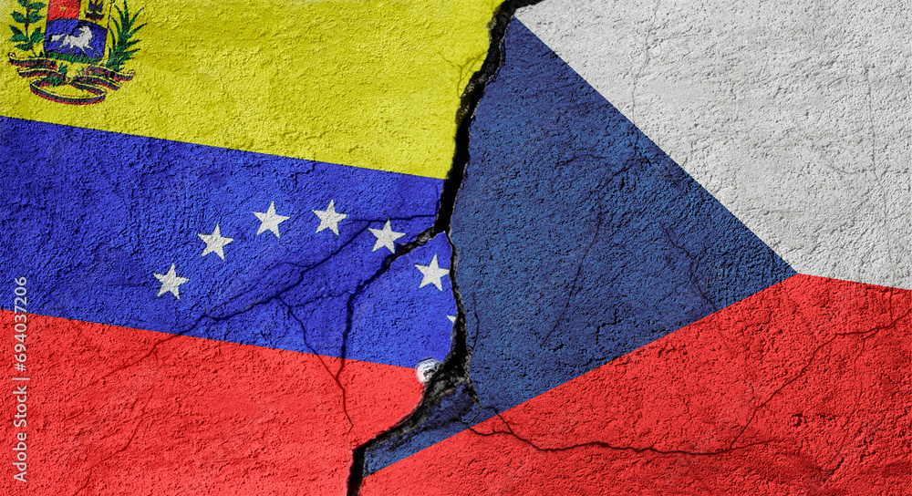 Venezuela and Czech Republic flags on a stone wall with a crack, illustration of the concept of a global crisis in political and economic relations