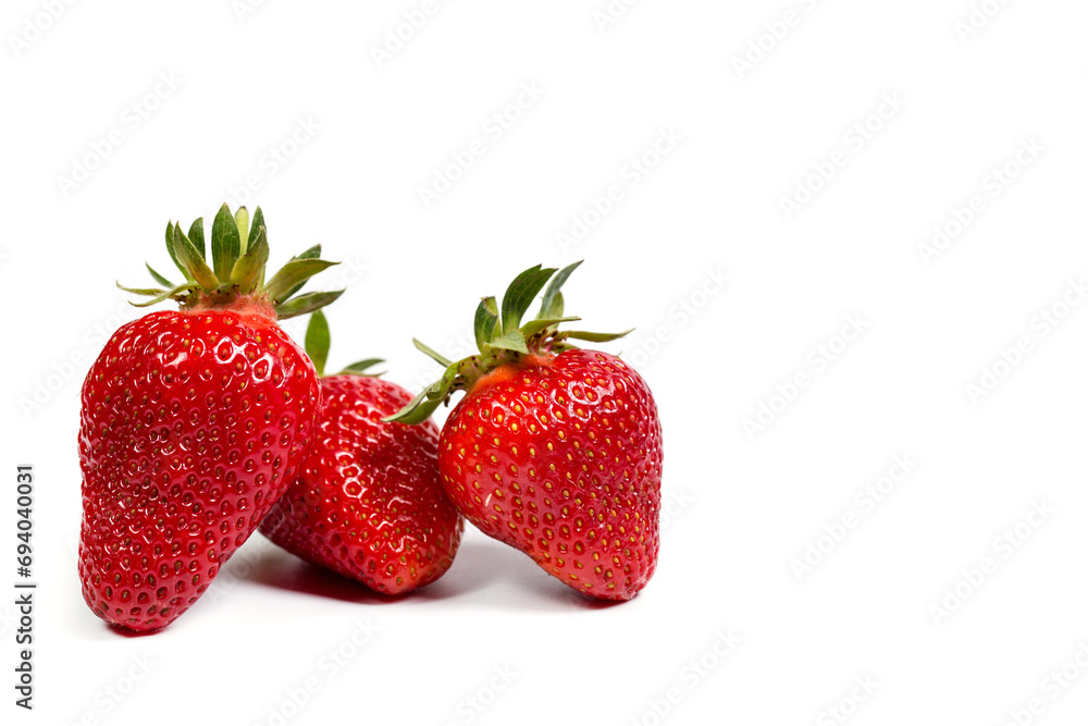 Fresh red strawberries on a white background, sweet strawberries for dessert Fresh red strawberries on a white background, sweet strawberries for dessert