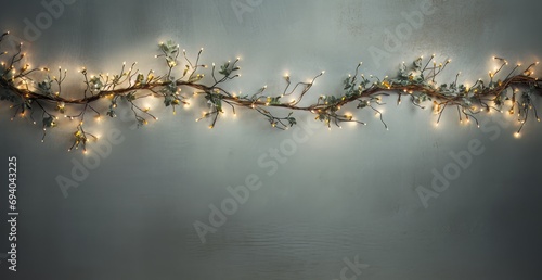 Christmas branches bathed in the warm glow of vintage lights