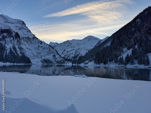 lake and snow covered mountains 