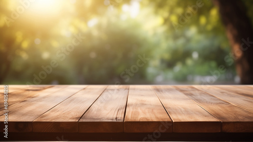 Empty wood tabletop with nature blurred background   copy space for product promotion