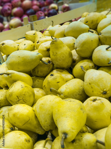 golden pears in market, closeup