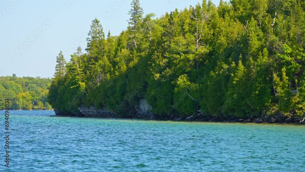 Magnificent shore of Lake Manitou, the jewel of Manitoulin Island in Northern Ontario, Canada. Largest lake on the island with pristine waters and captivating landscapes. Magnificent shore of Lake Manitou, the jewel of Manitoulin Island in Northern Ontario, Canada. Largest lake on the island with pristine waters and captivating landscapes.