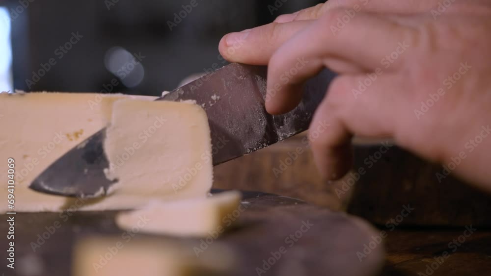 A piece Serra da Canastra Cheese that was cured in a cellar of a Brazilian Farm A piece Serra da Canastra Cheese that was cured in a cellar of a Brazilian Farm