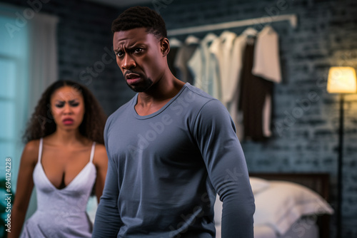 Couple in a room addressing relationship challenges, navigating mistrust and betrayal. Tense atmosphere unfolds against the bedroom backdrop, reflecting complex emotions  photo