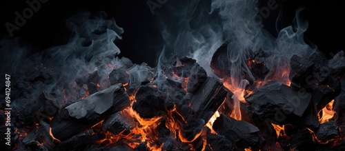 Fire ashes and coals have a dark grey-black texture. They're a flammable, hard rock.