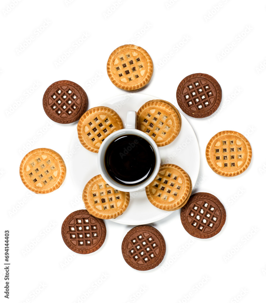 Round chocolate and vanilla cookies with a cup in front of a white background Round chocolate and vanilla cookies with a cup in front of a white background