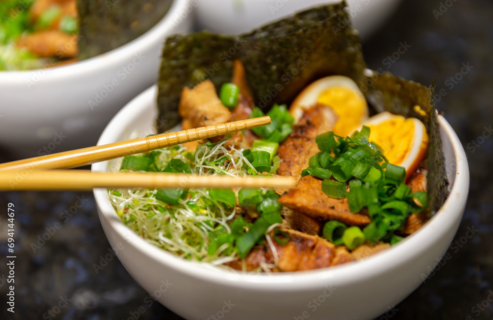 Udon Traditional Japanese soup, served in a bowl Udon Traditional Japanese soup, served in a bowl