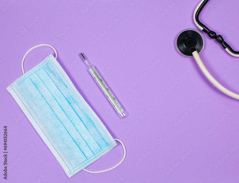 Medical instruments on purple background, doctor tools for treating people from illness