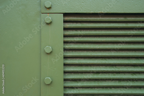 Metal part of a military vehicle with radiator