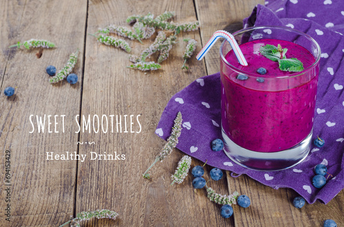 Fresh sweet blueberry smoothie with the note