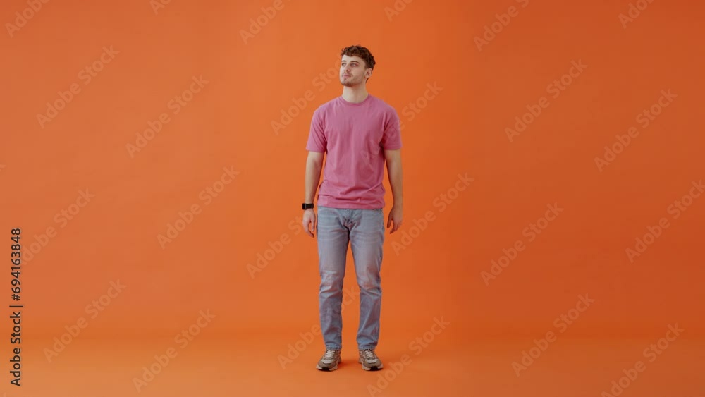Male yawning while snapping fingers and changing outfit Male yawning while snapping fingers and changing outfit
