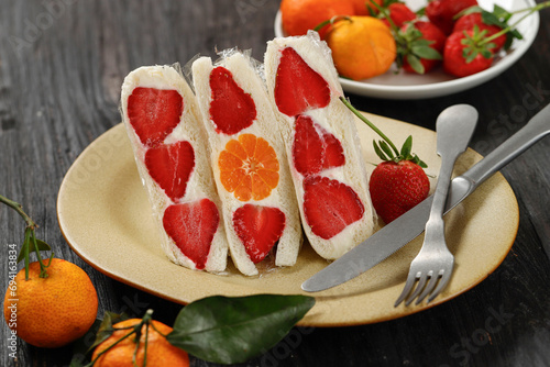 Japanese Fruit Sandwich or Sando with Cream, Orange, and Strawberry photo