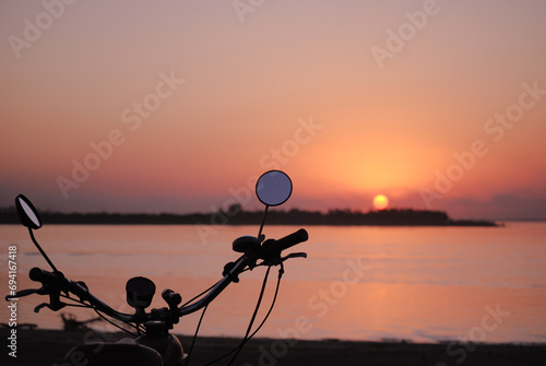 A vintage bicycle in the sunset photo