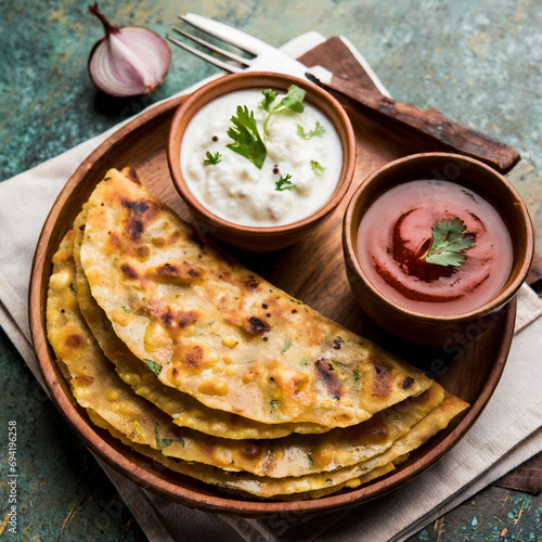 aloo paratha indian potato stuffed flatbread photo