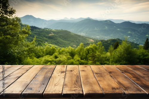 Wooden table on the mountain with green nature background