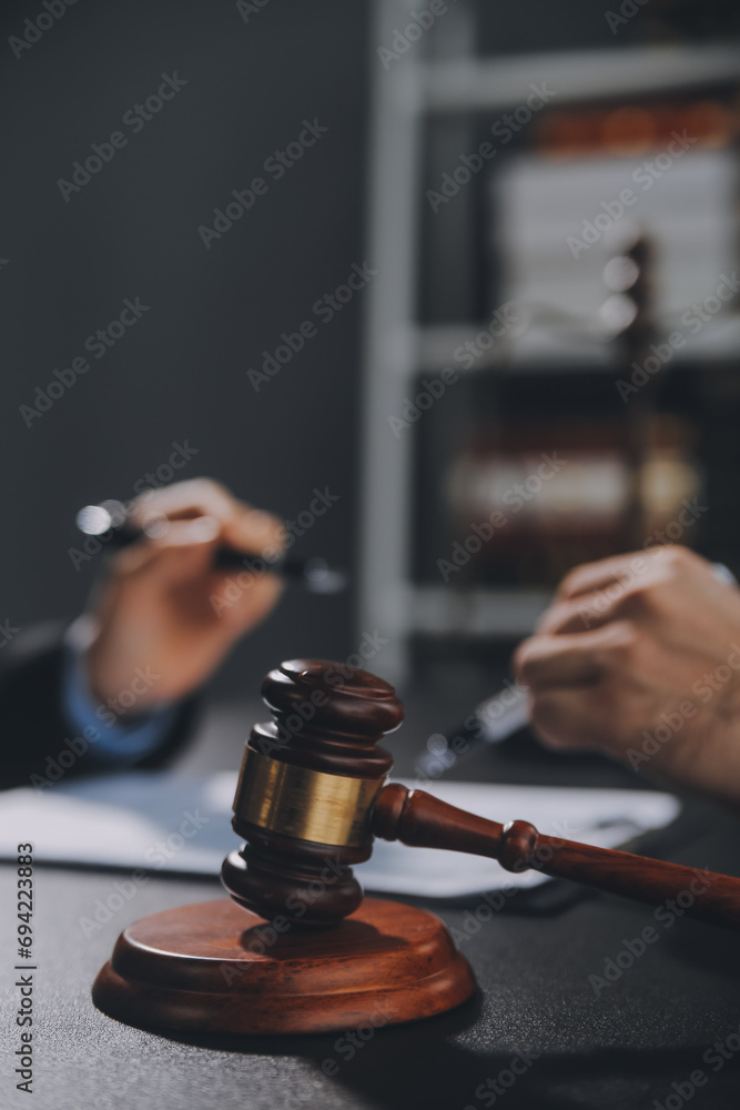 Customer service good cooperation, Consultation between a Businessman and Male lawyer or judge consult having team meeting with client, Law and Legal services concept. Customer service good cooperation, Consultation between a Businessman and Male lawyer or judge consult having team meeting with client, Law and Legal services concept.
