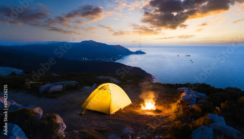 Tourist camping tent on top of mountain; drone view